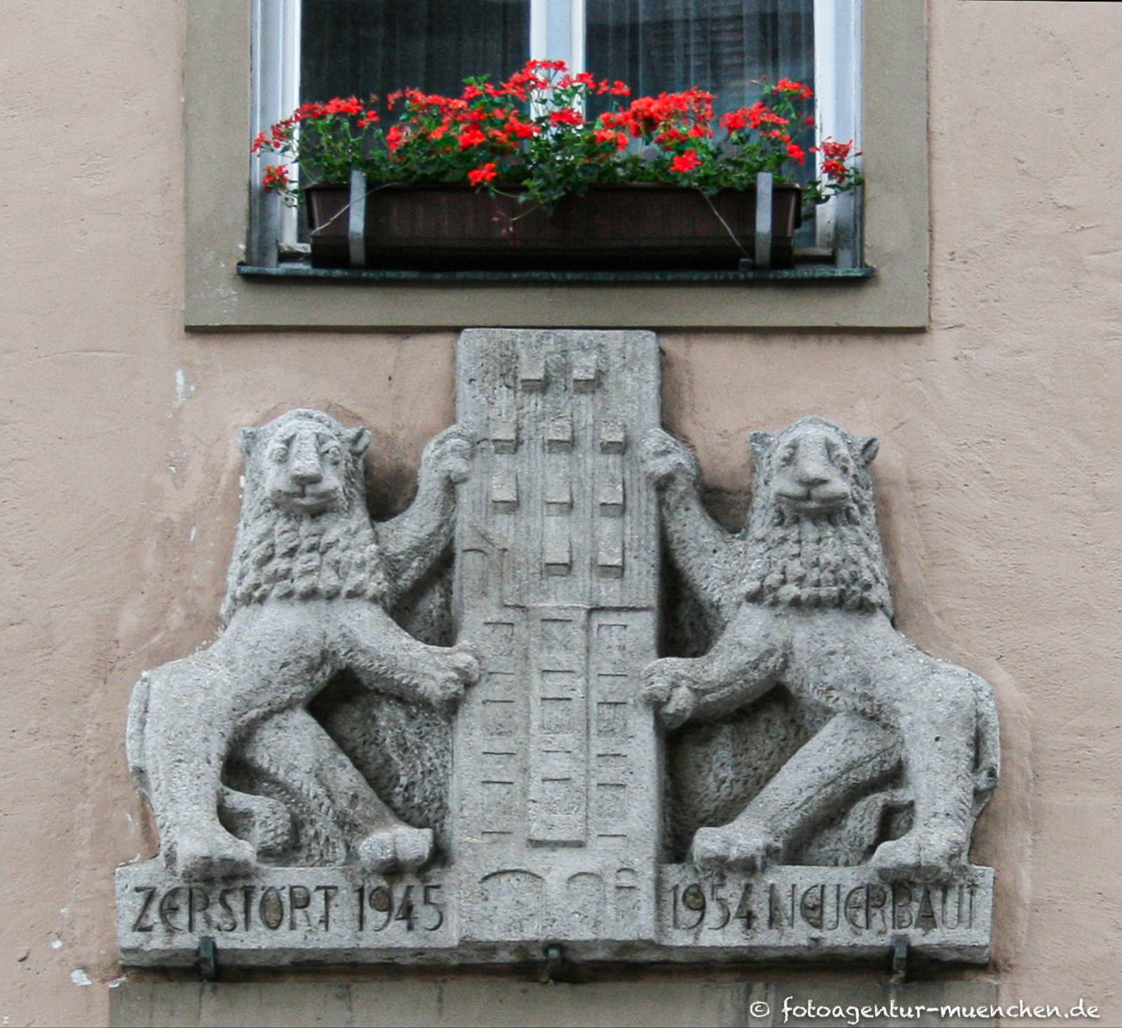 Löwen an der Donislfassade