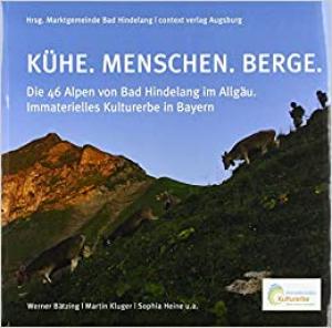 Kühe. Menschen. Berge.